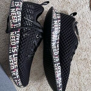 NOBULL black Mesh Sneakers with 'Love Is All You Need' Accent